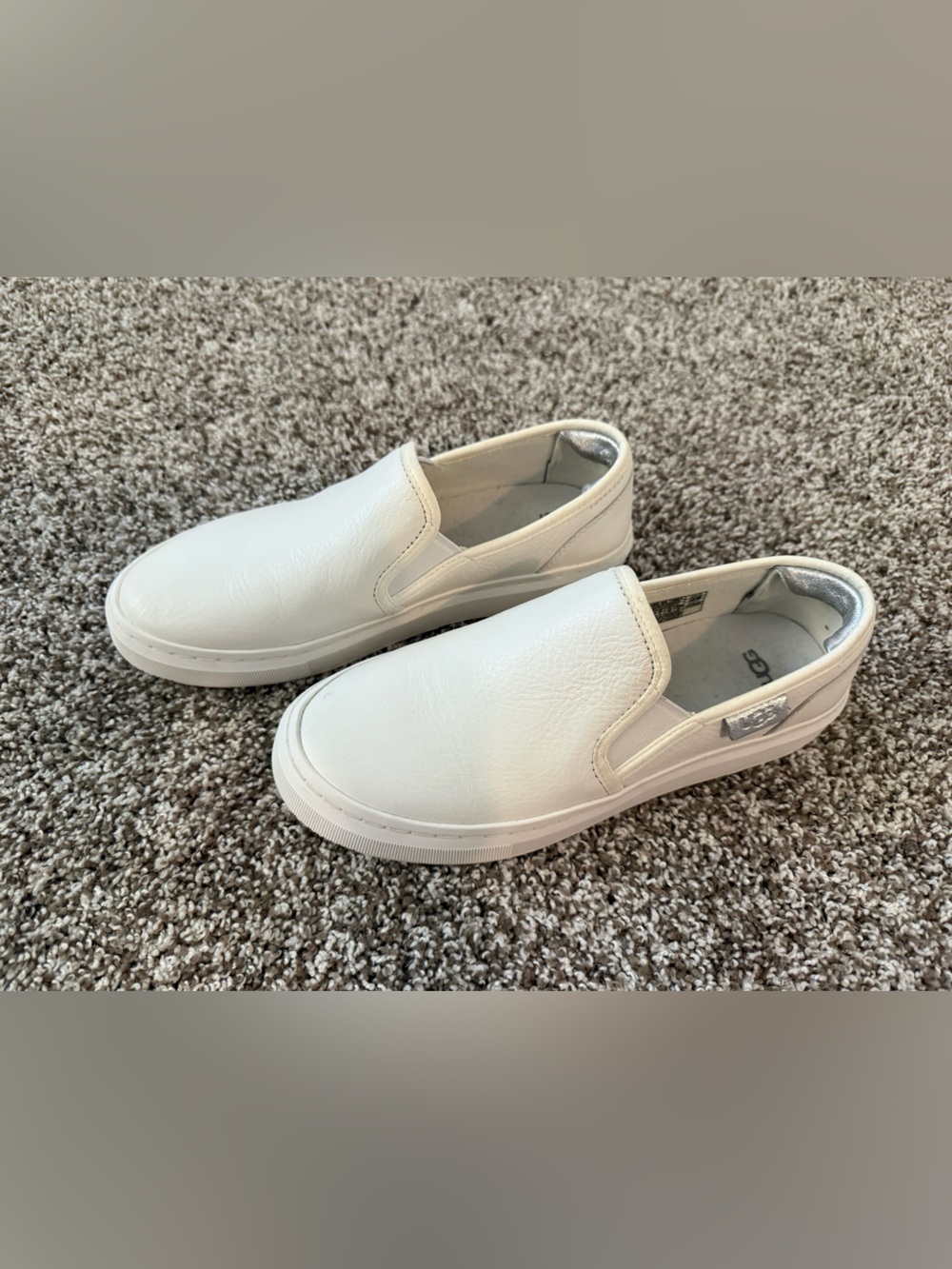 UGG Almeda Slip on. Size 7.